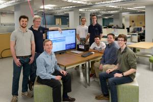 iol students and staff in lab