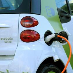 Electric car at charging station